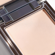 Finely milled matte pressed powder texture macro shot showcasing MCcosme private label quality.