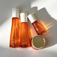 Flatlay view of multi-vitamin brightening skincare line for wholesale B2B distribution