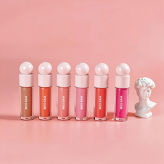 Full collection of private label liquid blush tubes with round caps, displayed for wholesale cosmetic buyers.