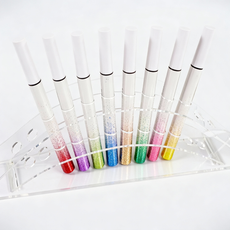 Front display of wholesale glitter liquid eyeliner pens in gradient packaging. Available for private label OEM at MCcosme.